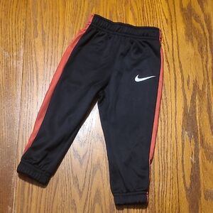 Nike Kids Black Track Pants with Red Side Stripe -  18 Months